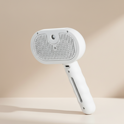 White handheld grooming brush on a beige background