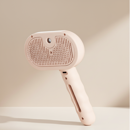 Pink pet grooming brush on a beige background